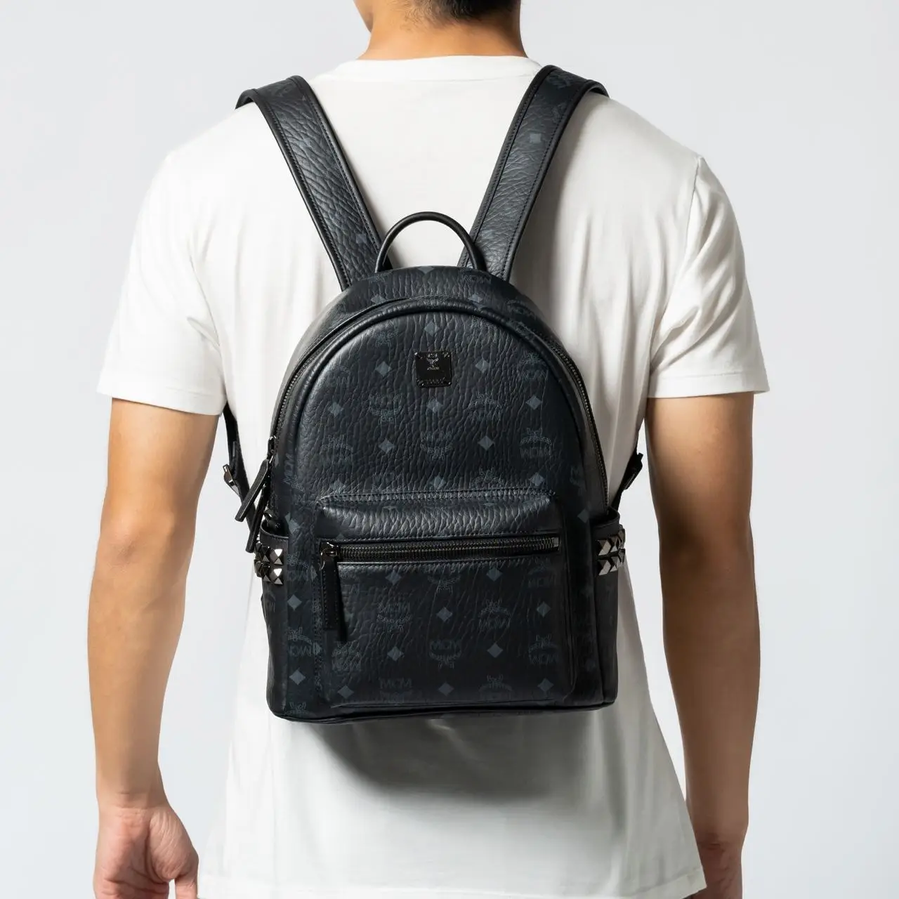 Mcm logo backpack best sale