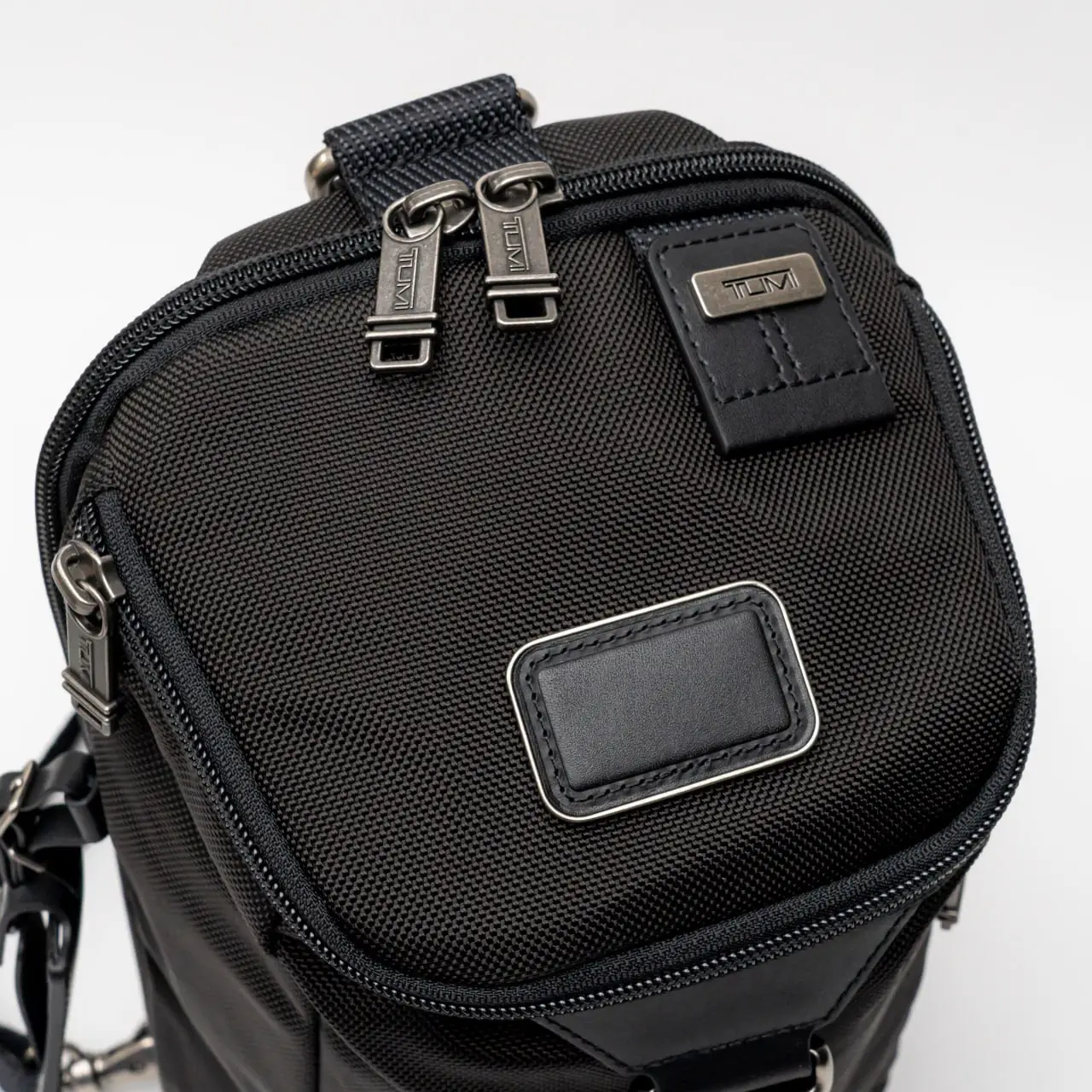 Harga sling bag tumi original best sale