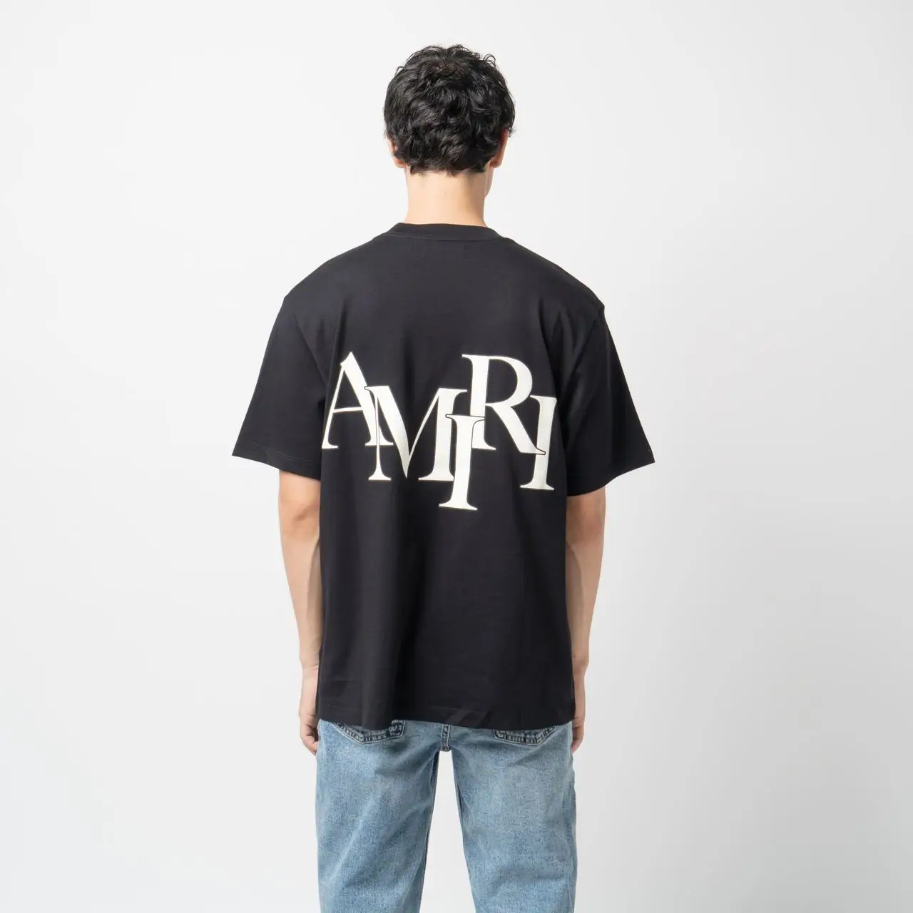 Amiri Staggered Logo T-Shirt Black – voilà.id