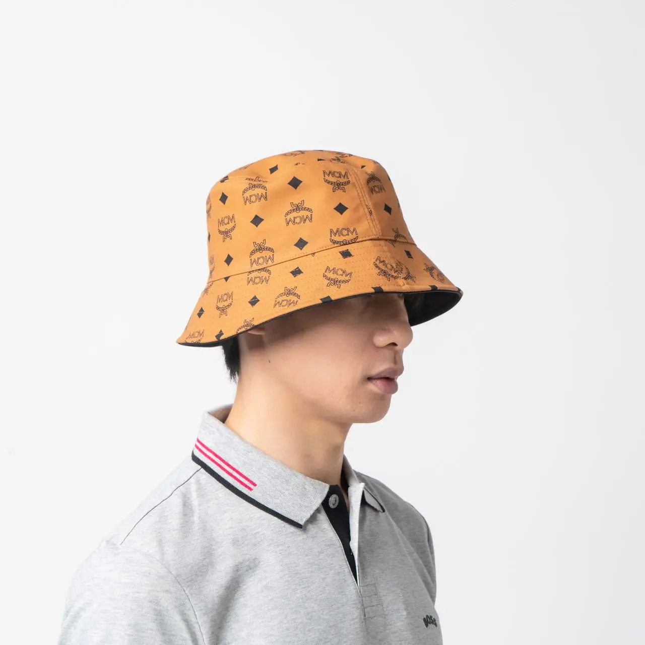 MCM Monogram Printed Reversible Bucket Hat Cognac Black  display picture 2