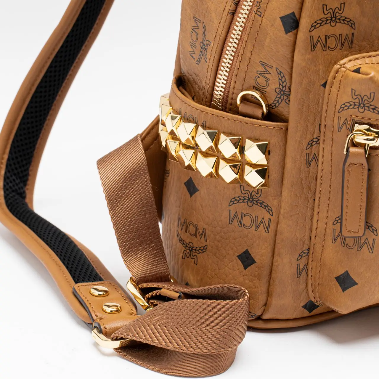 MCM Stark Side Studs Mini Backpack Visetos Cognac – voilà.id