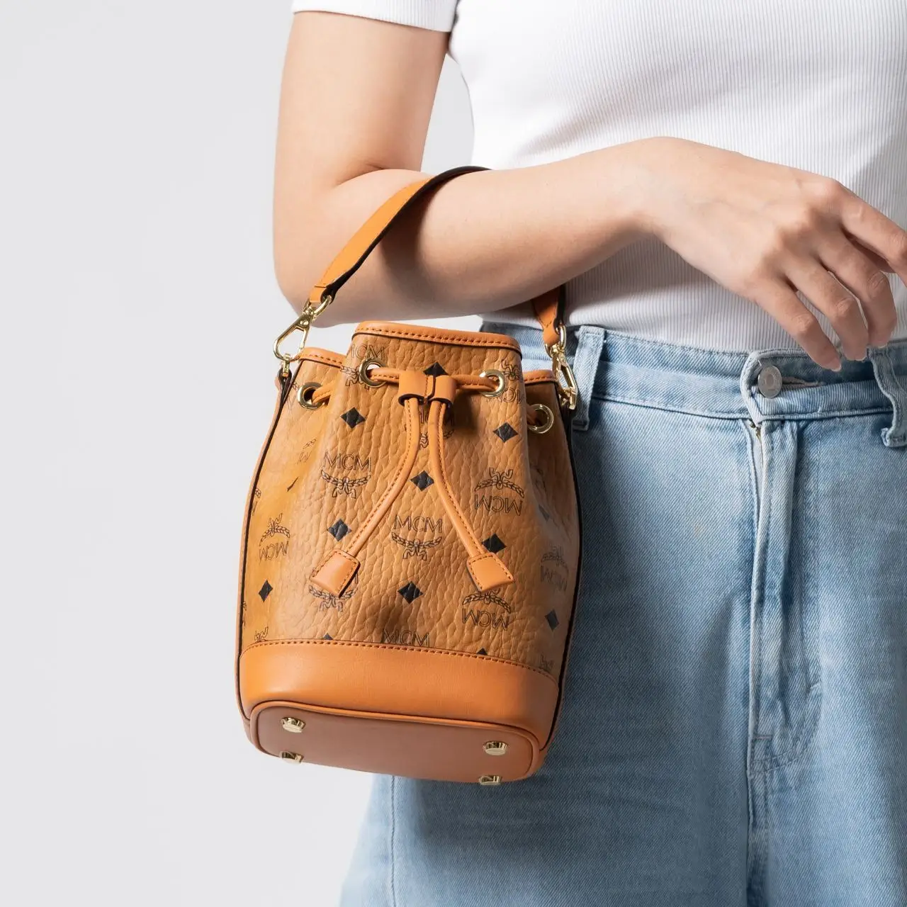 MCM Mini Dessau Drawstring Bag in Visetos Cognac – voilà.id