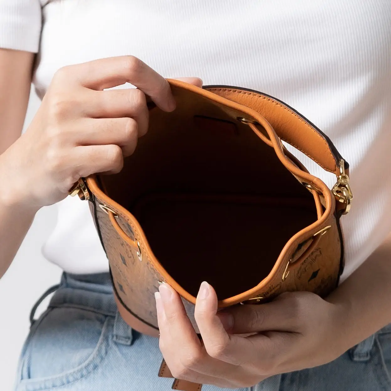 MCM Mini Dessau Drawstring Bag in Visetos Cognac – voilà.id