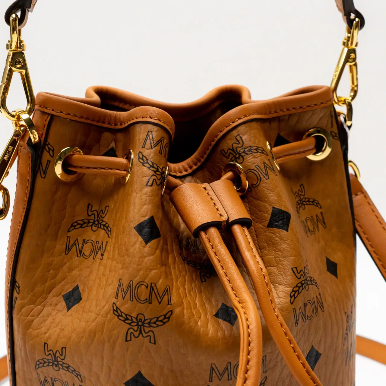 MCM Mini Dessau Drawstring Bag in Visetos Cognac – voilà.id