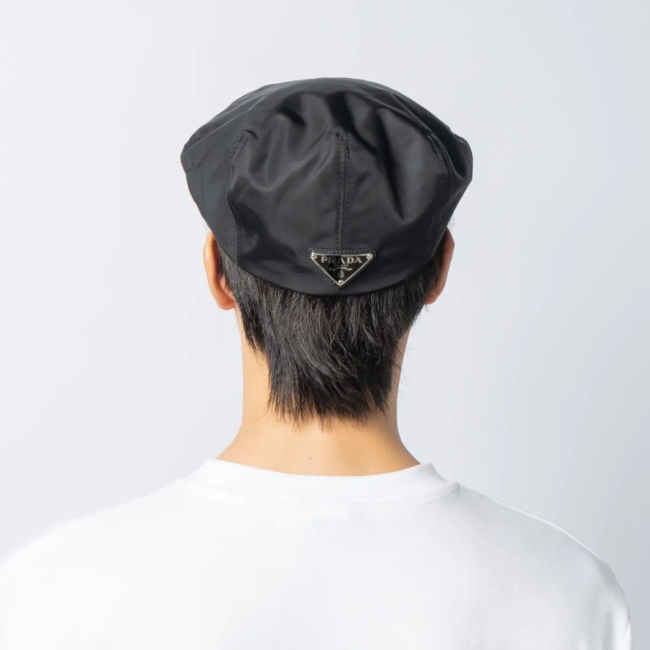 Prada Enameled Metal Triangle Logo Re-Nylon Beret Hat Black – voilà.id