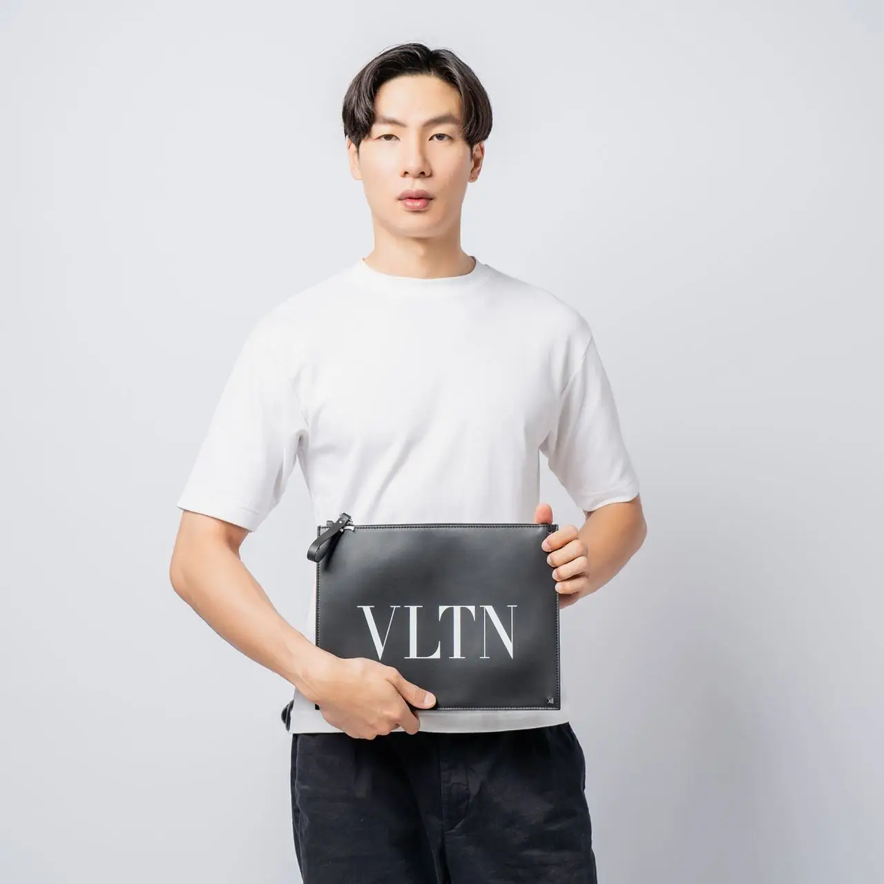 Valentino Garavani VLTN Pouch Black Logo White with Logo Embossed 