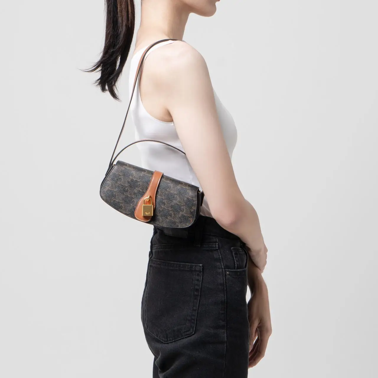 Celine Clutch On Strap In Triomphe Canvas and Calfskin Tan – voilà.id