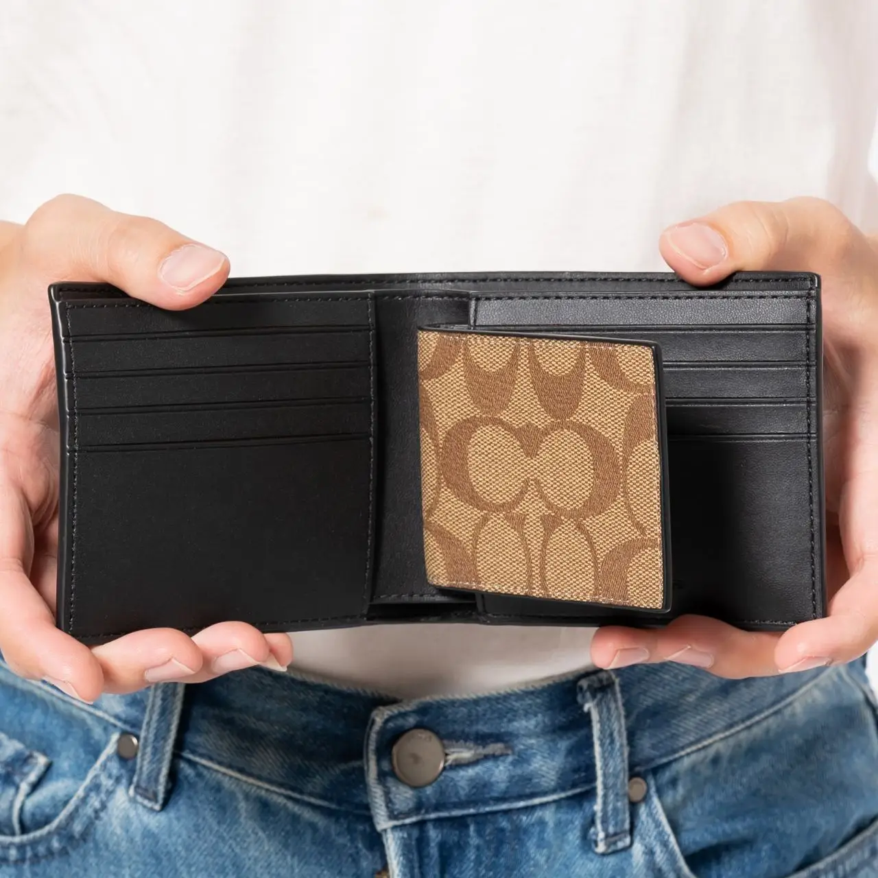 Signature canvas coach wallet hotsell