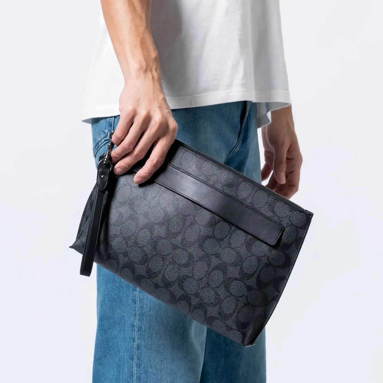 Carryall pouch in signature canvas sale