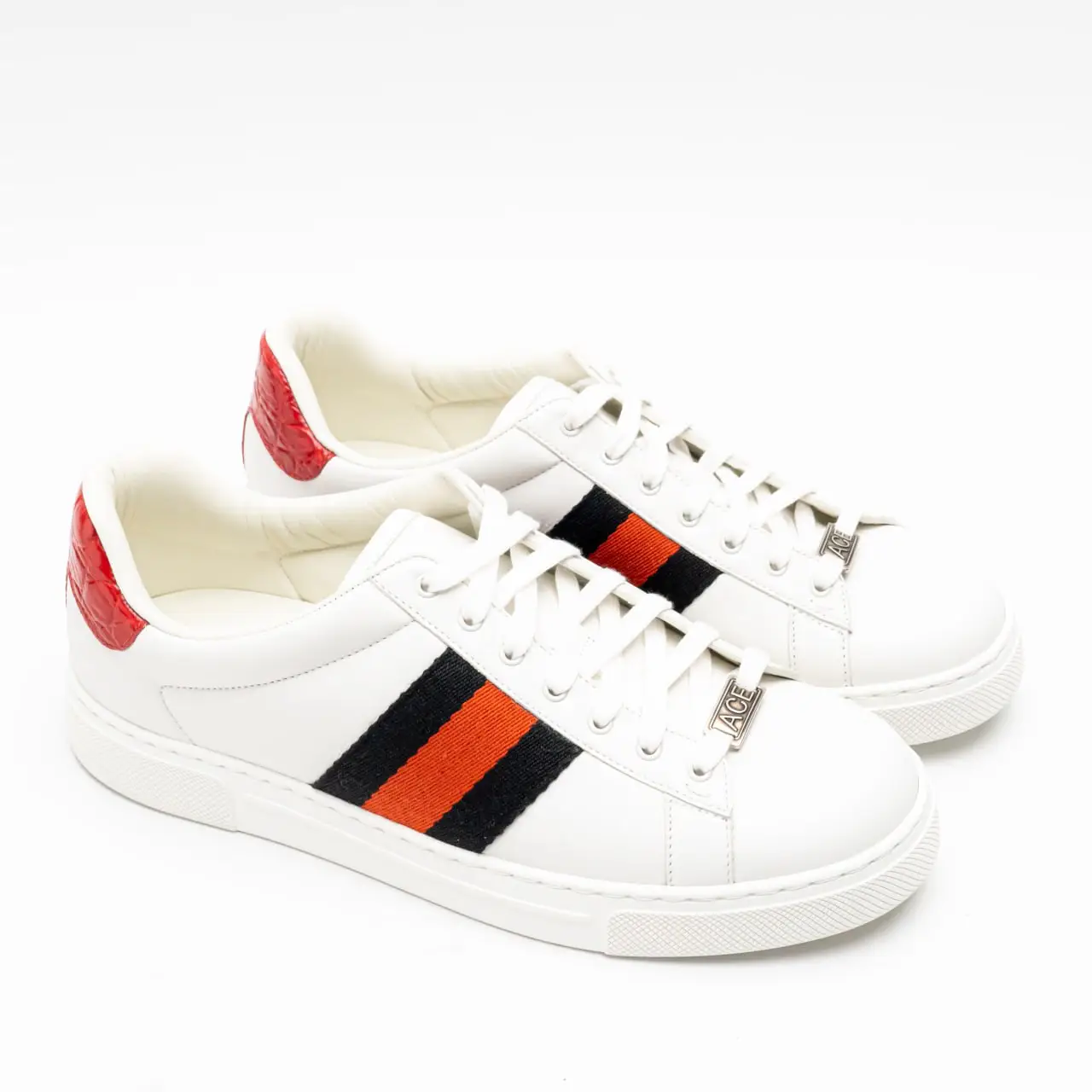 White gucci shoes with red gs top