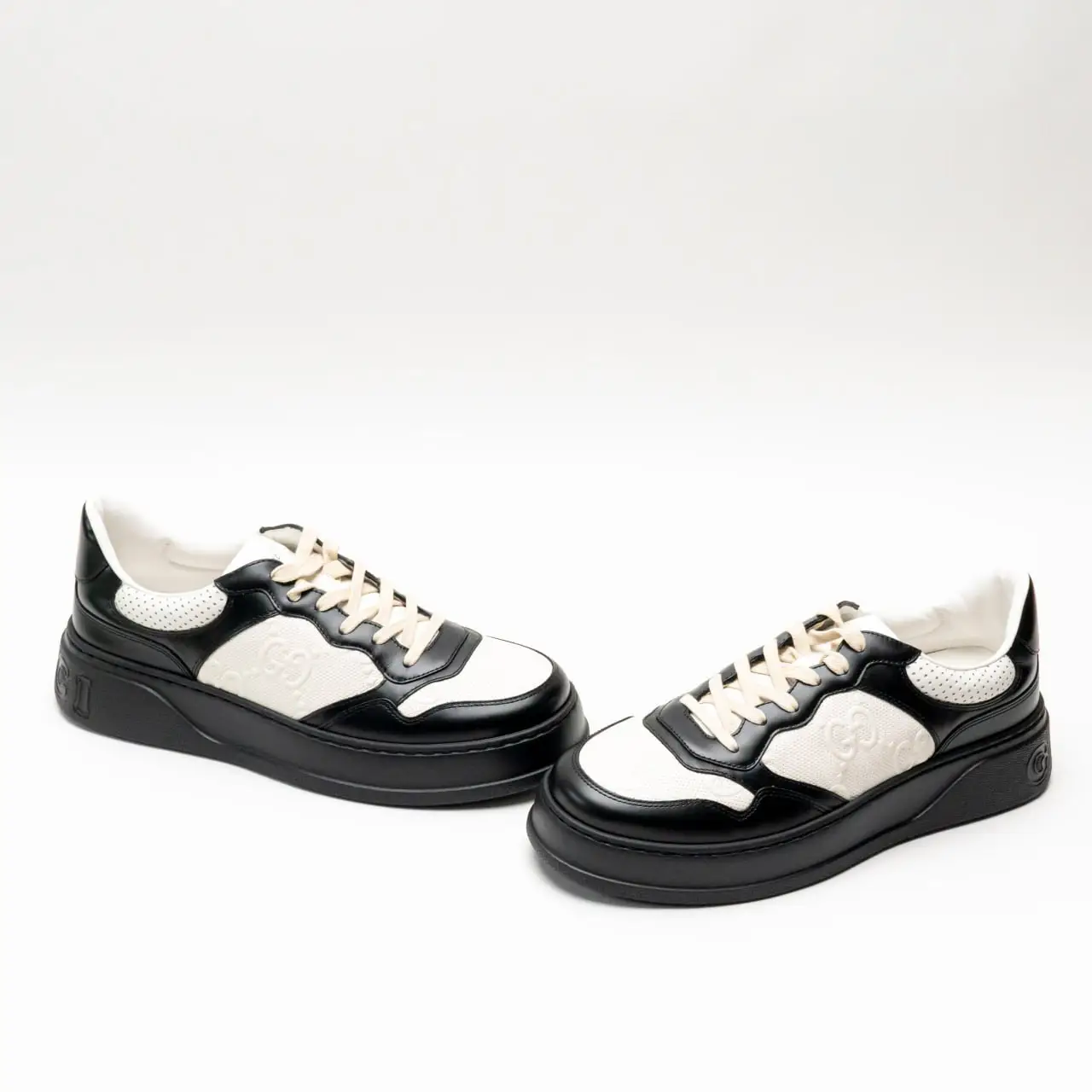 Gucci GG Embossed Leather Sneakers Black/White Men – voilà.id