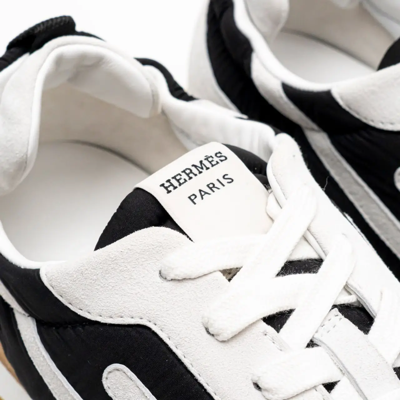 Hermès Jet Canvas and Suede Goatskin Sneakers Black / White – voilà.id