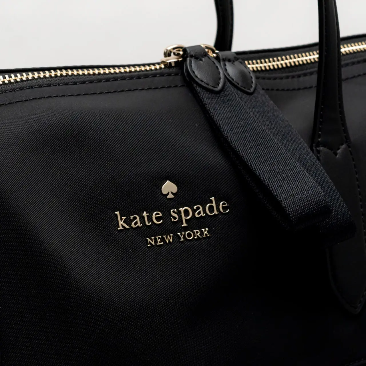 Kate cheapest spade weekender bag color is black