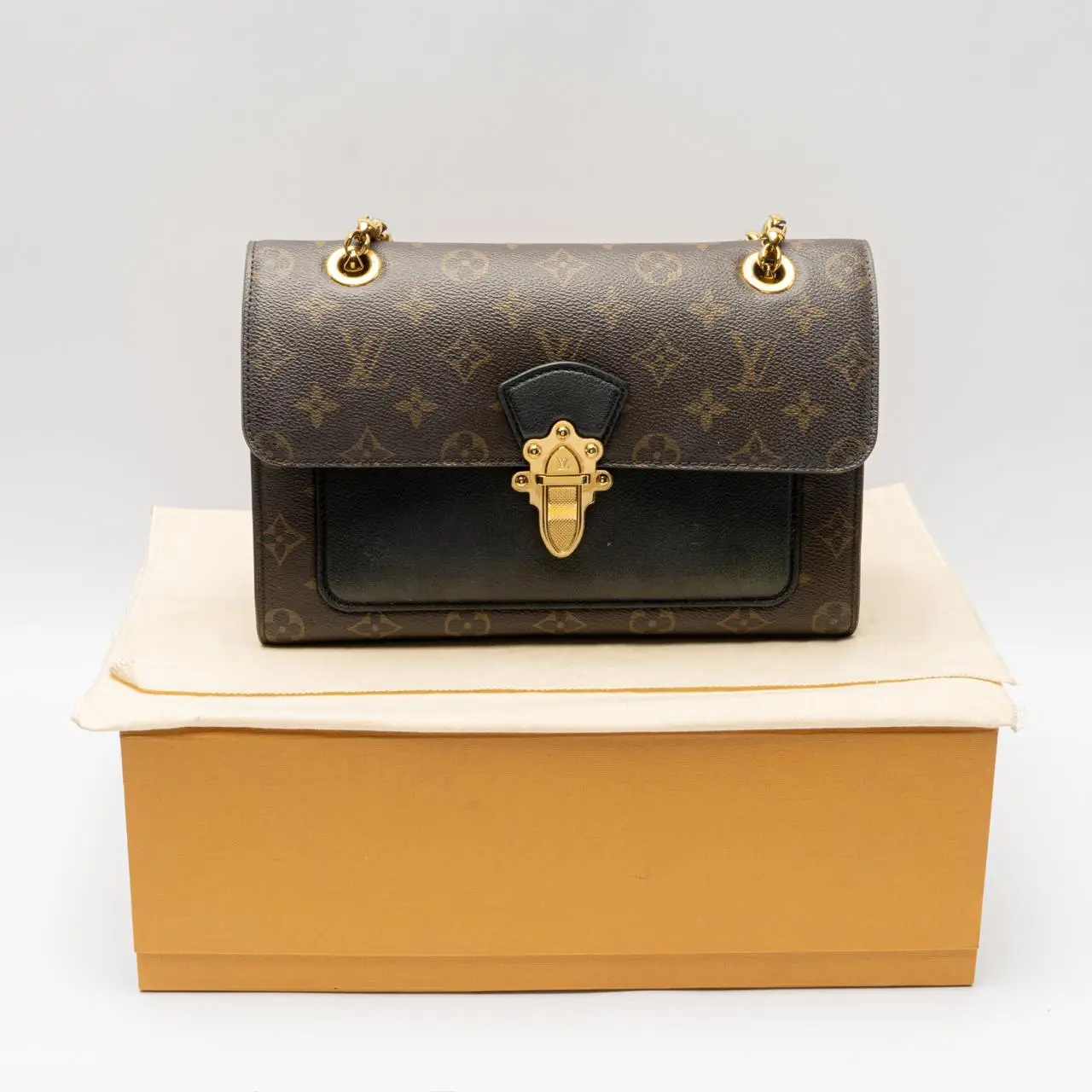 Louis Vuitton Victoire Monogram Canvas Handbags Brown Black – voilà.id