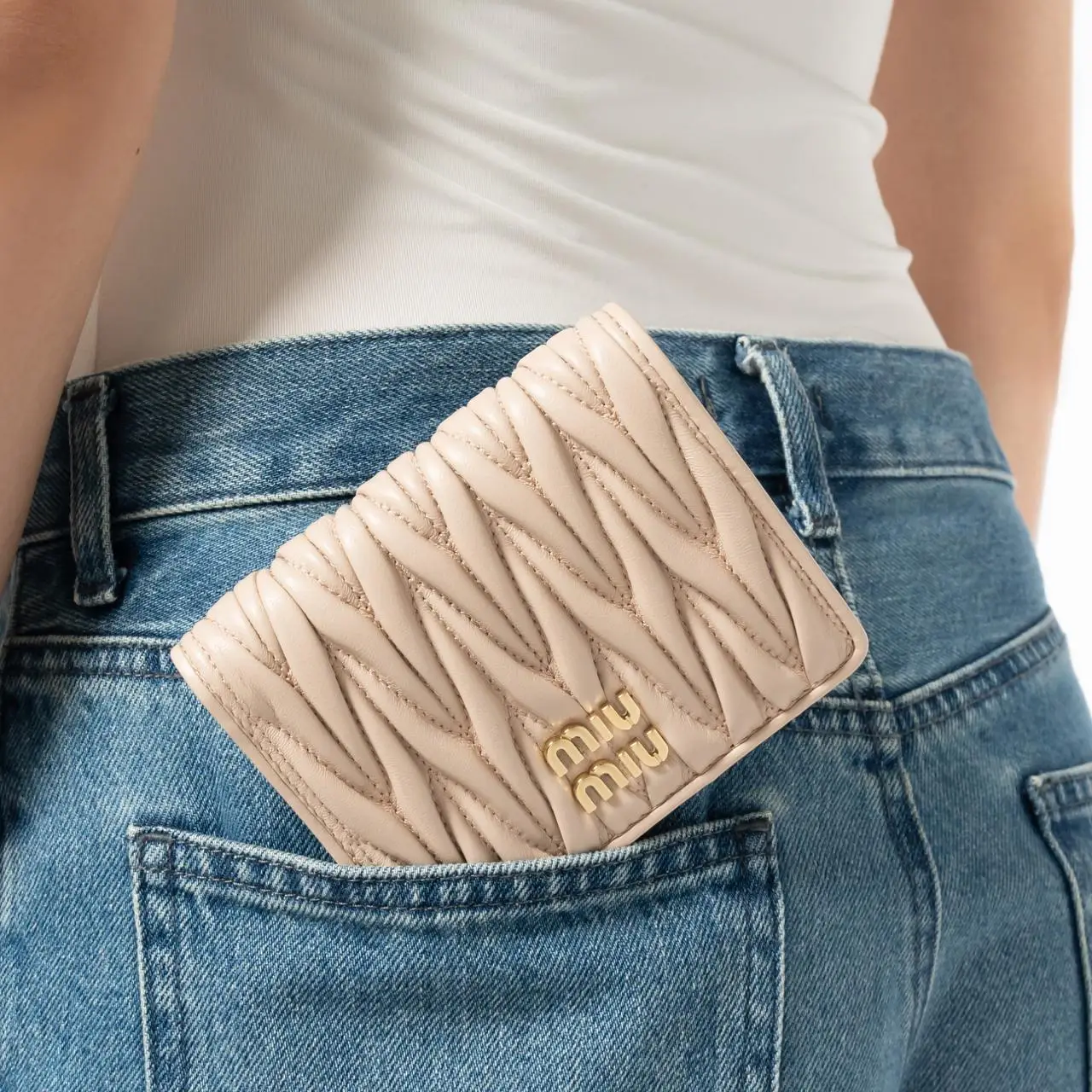 【MiuMiu】Small matelasse nappa leather wallet ナッパ 財布 Small matelassé nappa leather wallet Black | Miu Miu