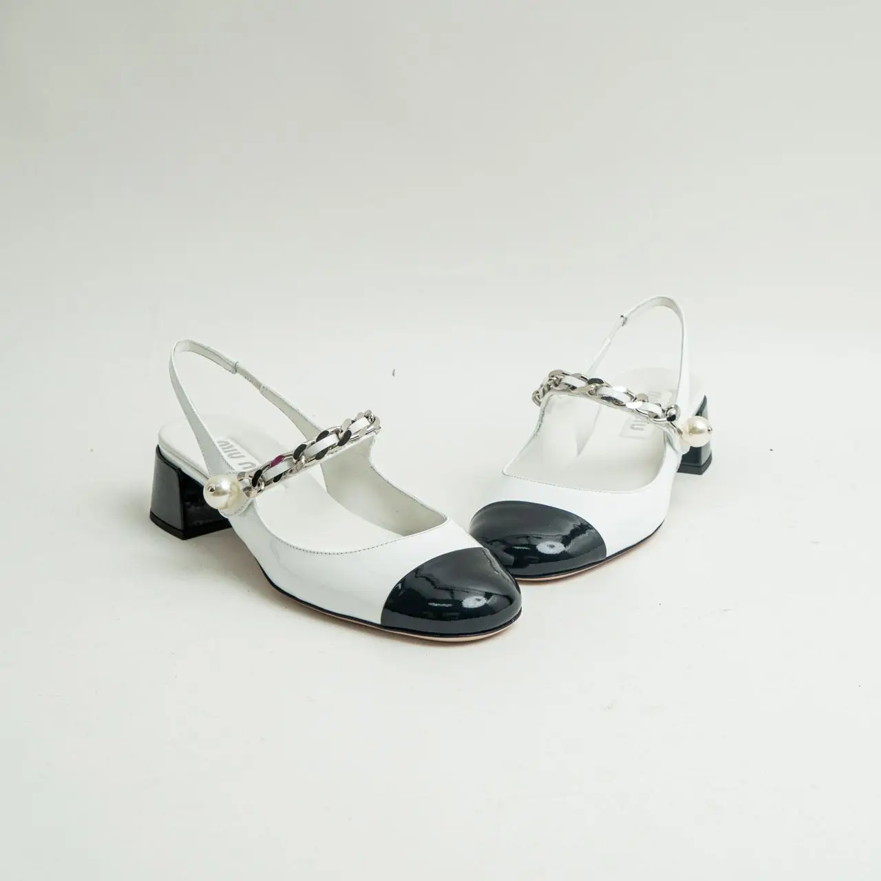 Miu Miu Two-Tone Slingback 35 Patent Leather Pumps White Miu Miu Two-Tone Slingback 35 Patent Leather Pumps White