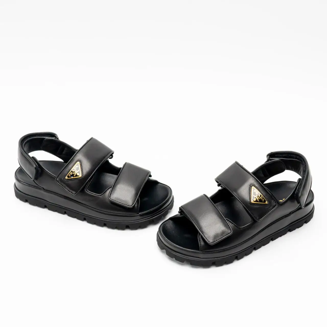 Prada triangle-logo leather sandals | Eraldo.com US