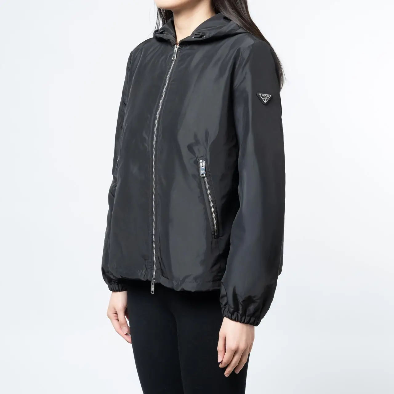 Prada Triangle Logo Patch Windbreaker Hooded Jacket Black – voilà.id