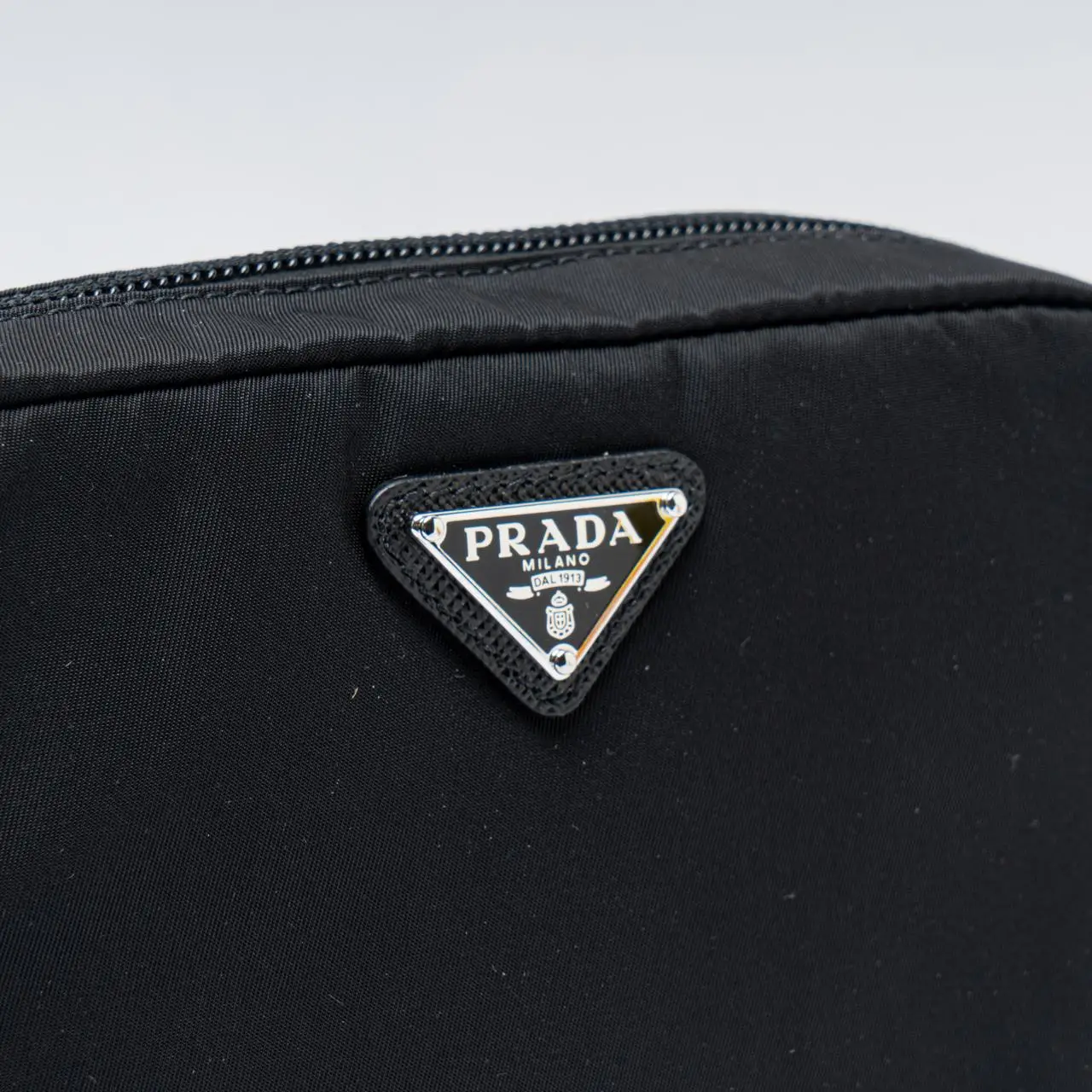 Prada Re-Nylon Triangle Logo Travel Pouch Black – voilà.id