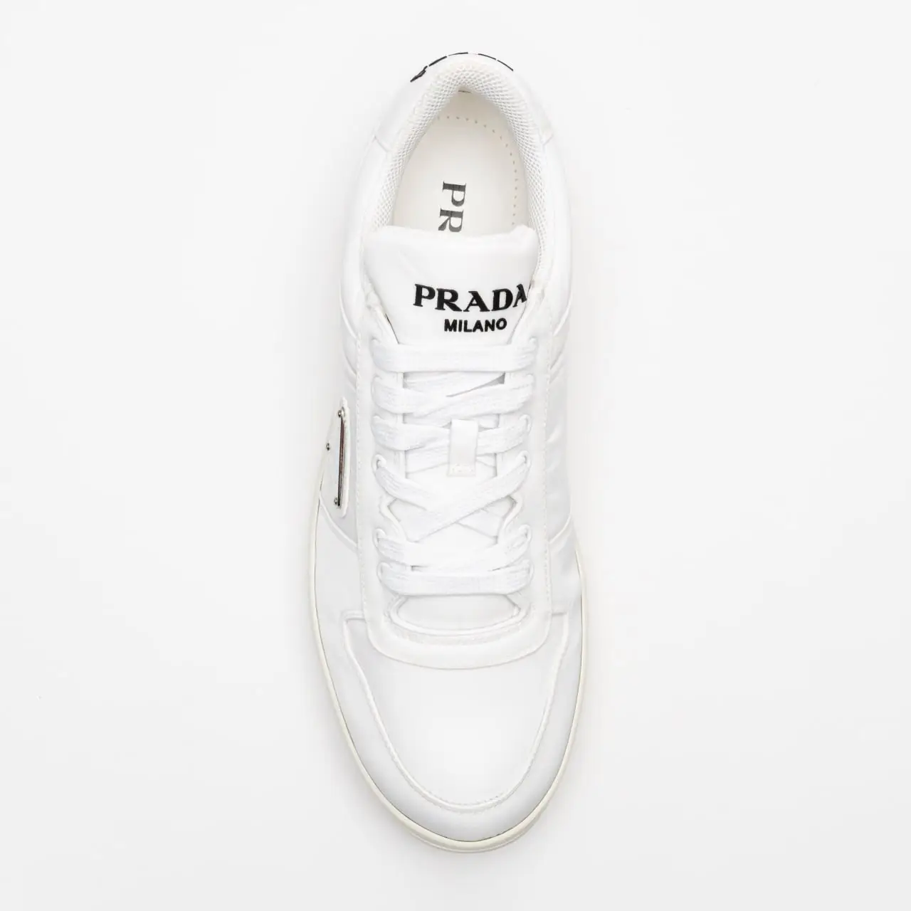 Prada Re-Nylon Sneakers Enameled Metal Triangle Logo White – voilà.id