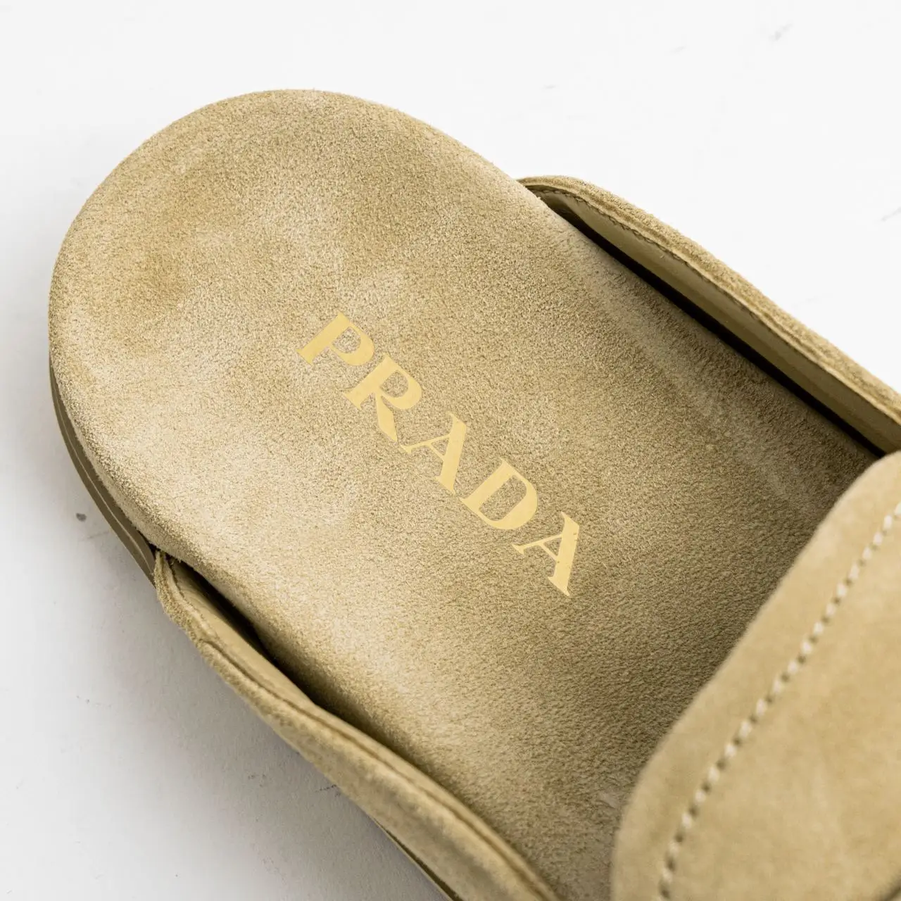 Prada Triangle Gold Enamel Logo Suedes Sabots Ecru – voilà.id