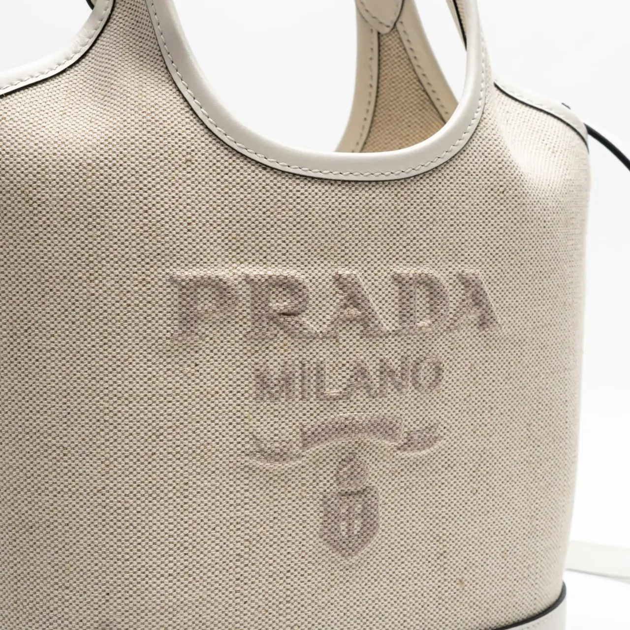 Prada Logo Embossed Linen Blend Leather Mini-Buckle Bag