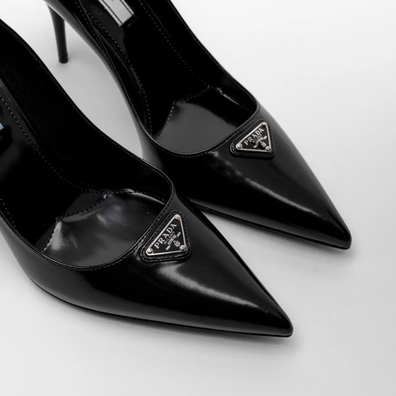 Prada Brushed 85 Triangle Logo Leather Pumps Black – voilà.id
