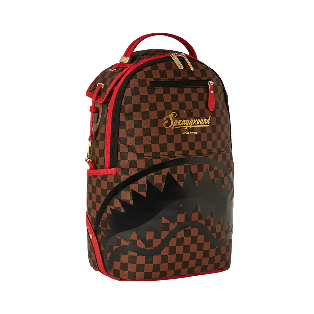 Gold Sprayground backpack hotsell sharkbite