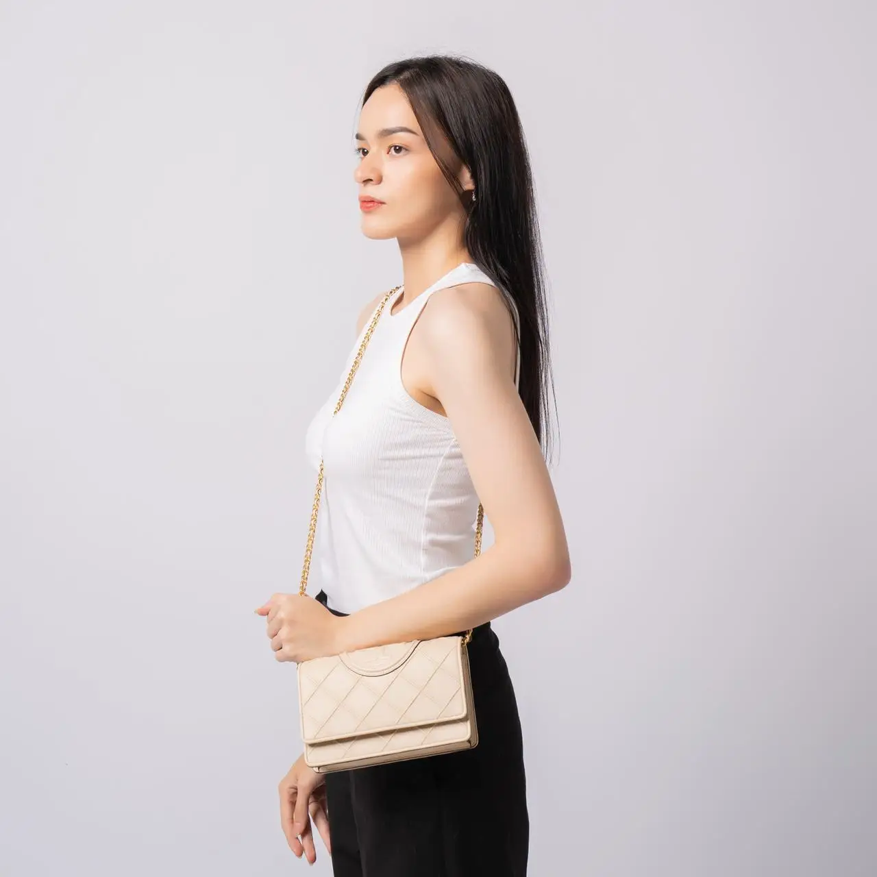 Tory burch fleming soft leather clutch 2025