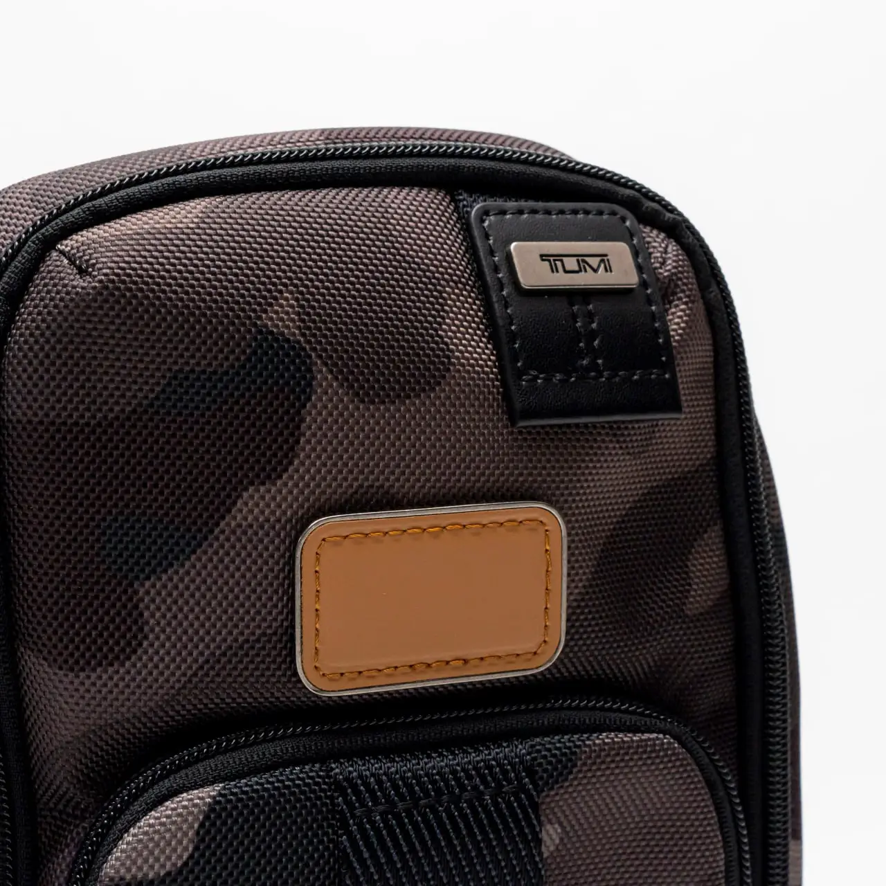 Tumi Fife Slim Sling Bag Canvas Grey/Brown/Black – voilà.id Tumi Fife Slim Sling Bag Canvas Grey/Brown/Black – voilà.id